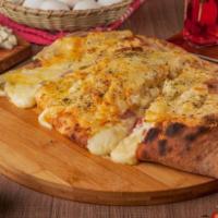 Build Your Own Calzone · Build Your Own Calzone starts as a cheese calzone (Our 72 hour cold-rise pizza dough, organi...