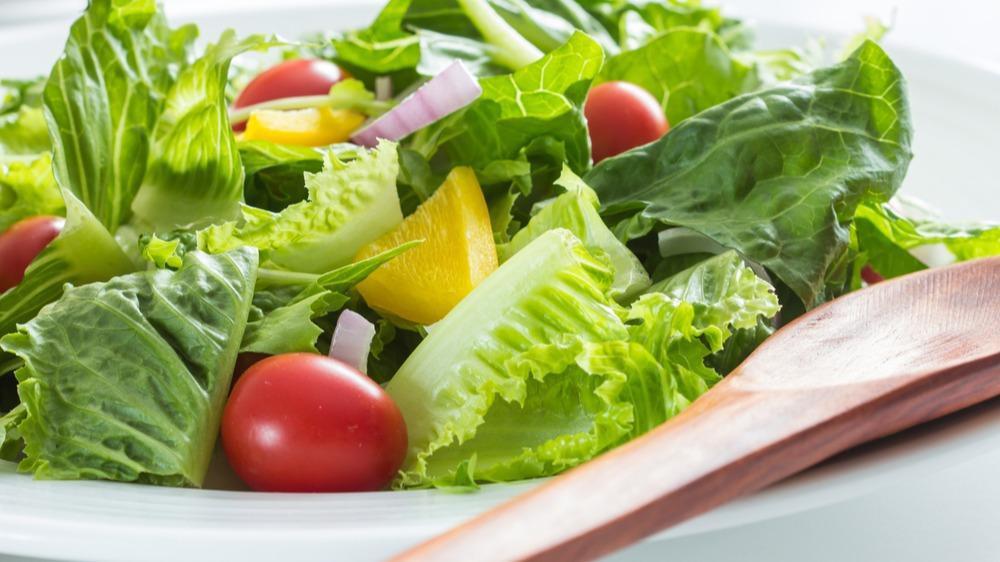 Green Salad · Romaine lettuce, organic cherry tomatoes, mushrooms, green bell pepper, sweet onions, organic baby carrots, and croutons with your choice of dressing.