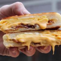Breakfast Bao · crispy bacon, egg, USA cheese, garlic bacon aioli, wrapped in a steamed bun

*No modifications