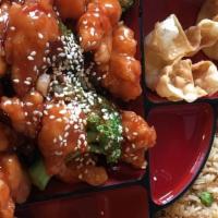 Sesame Chicken · Battered chicken glazed in our tangy honey brown sauce.