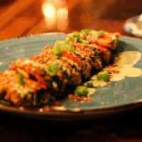 Seattle Masubi Roll · Our take on the Seattle Masubmi Roll, Cream Cheese, spam, nori, guamanian red rice and fried...