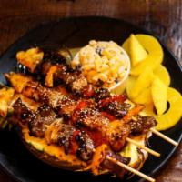 Sirloin Steak Skewers · BBQ in bamboo skewers is what Filipino Style BBQ is all about. It is composed of thinly slic...