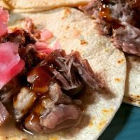 Hawaiian Kalua Roasted Pork Tacos W/Teriyaki Bbq Glaze · This delicious slow-roasted pork is rubbed with sea salt and smoked for hours to recall the ...