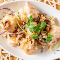 Honey Walnut Prawns · With trace amount of peanuts and other allergens. Battered and lightly fried prawns sautéed ...