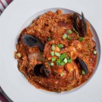 Jambalaya · Rice, andouille sausage, shrimp and mussels, holy trinity, roasted tomato sauce.