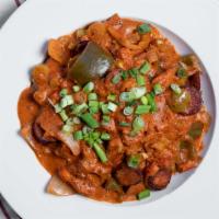 Crawish Etouffee · Tomato based stew, holy trinity, creamy butter, andouille sausage. Add fried catfish for add...