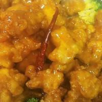 Orange Flavor Chicken · Deep-fried chunks chicken, seasoned with orange peels, surround with broccoli.