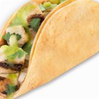 Baja Taco · Your choice of protein on corn tortillas with salsa, onions and cilantro.