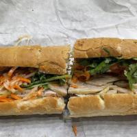 Vietnamese Ham Sandwich · Vietnamese ham, pate, pickled carrots and daikons, onions, cilantros, cucumbers and peppers.