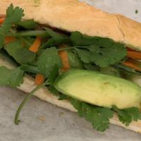 Vegetarian Sandwich · Avocados, pickled carrots and daikons, onions, cilantros, cucumbers and jalapeño peppers.