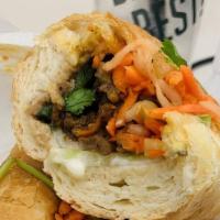 Meatball Sandwich · Meatball, pickled carrots and daikons, onions, cilantros. Cucumbers and jalapeño peppers.