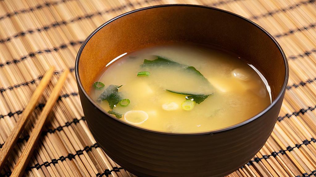Miso Soup  · Soybean broth, tofu, seaweed & scallions