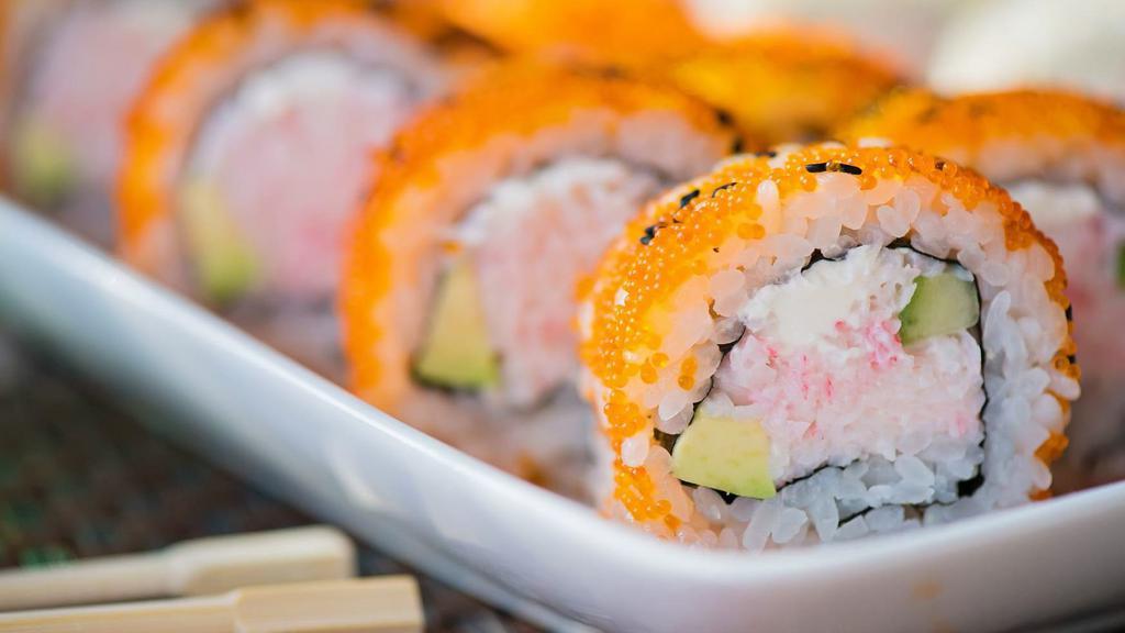 California Roll  · Crab stick, avocado & cucumber wrapped inside-out with rice, sesame seed & tobiko