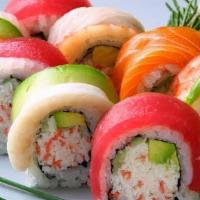 Rainbow Roll  · Crabmeat, avocado & cucumber wrapped inside-out with assorted fish on top