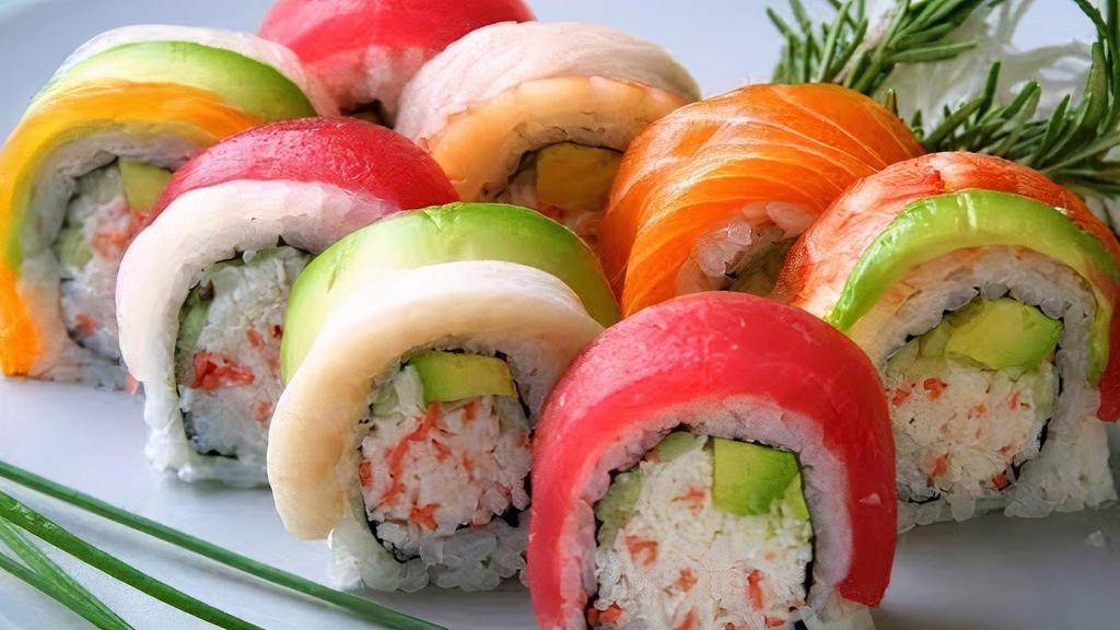 Rainbow Roll  · Crabmeat, avocado & cucumber wrapped inside-out with assorted fish on top
