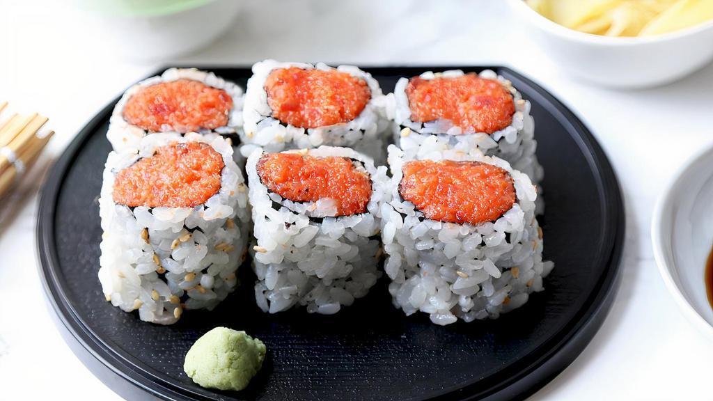 Spicy Tuna Roll · Tuna  mixed w. spicy mayonnaise wrapped inside-out w. rice & sesame seed.