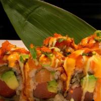 Bmw Roll  · Fresh tuna, salmon, wrapped avocado inside, topped with pepper tuna, salmon and three signat...