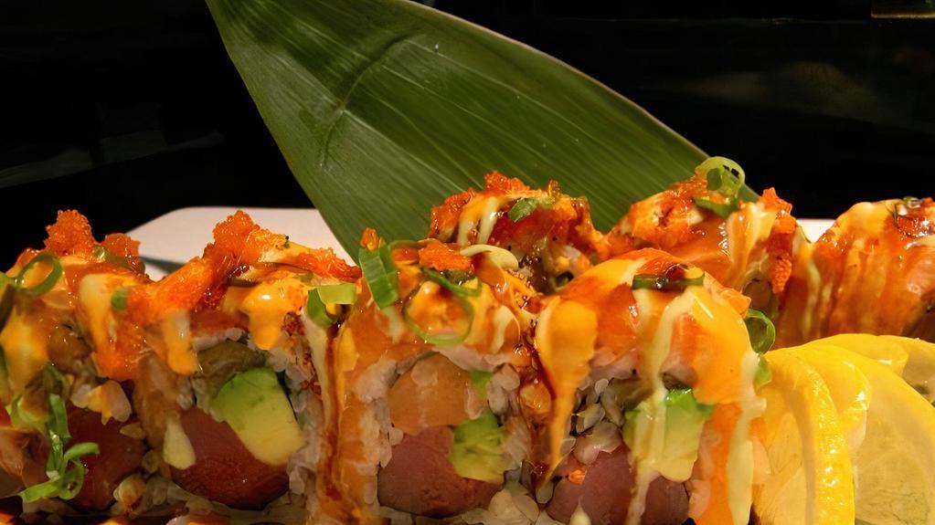 Bmw Roll  · Fresh tuna, salmon, wrapped avocado inside, topped with pepper tuna, salmon and three signature sauces
