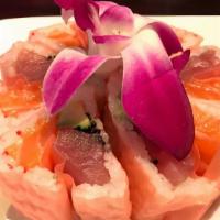 Sakura Roll  · Tuna, salmon, yellowtail, crab stick, asparagus & tobiko wrapped in soybean paper