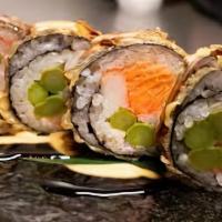 Dynamite Roll  · Salmon, cucumber, asparagus and spring mix deep fried tempura style and topped with two kind...