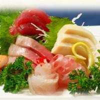 Sashimi Regular  · 18 pieces of assorted raw fish and a bowl of seasoning sushi rice