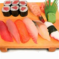 Sushi Regular · 8 pieces of assorted raw fish on seasoned rice and one tuna roll