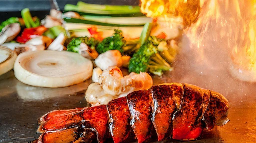 Hibachi Twin Lobster · Two fresh cold water lobster tail grilled to perfection and served with our hibachi vegetables.