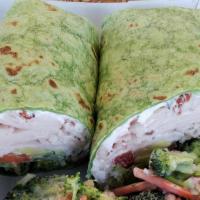 California Wrap · Made with turkey, bacon, cream cheese, avocado, tomato, red onion, and
lettuce prepared with...