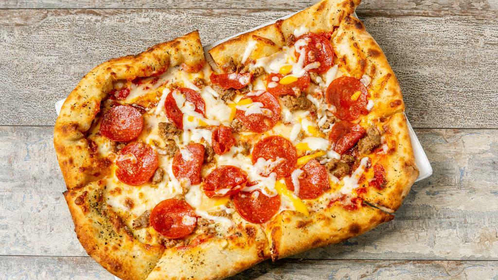 The Angry Italian · With slight bite! a blend of fresh cheeses topped with pepperoni, red pepper flakes, spicy Italian sausage, and roasted garlic. Served with red sauce on our hand tossed crust.