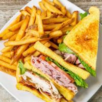The Sinrock Club · BIG alert! A classic double stack on wheat or white bread with turkey, bacon, ham, cheddar, ...