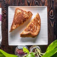 Kids Grilled Cheese · Cheddar cheese served on grilled whole grain bread