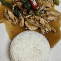 L Pad Basil · Stir-Fried with choice of meat, basil leave, yellow onions, bell pepper, and jalapenos in br...