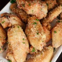 Garlic Parmesan Wings · Delicious wings tossed in a classic garlic Parmesan sauce.