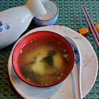 Miso Soup · Famous and traditional Japanese soup with organic  tofu and wakame seaweed.