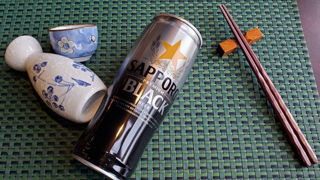 Sapporo Premium Black Beer ( 20 Oz ) · Sapporo Premium Black is crafted with roasted dark malts and a refined hop bitterness that is complemented by a sweet, round fullness and distinct coffee and chocolate flavors.