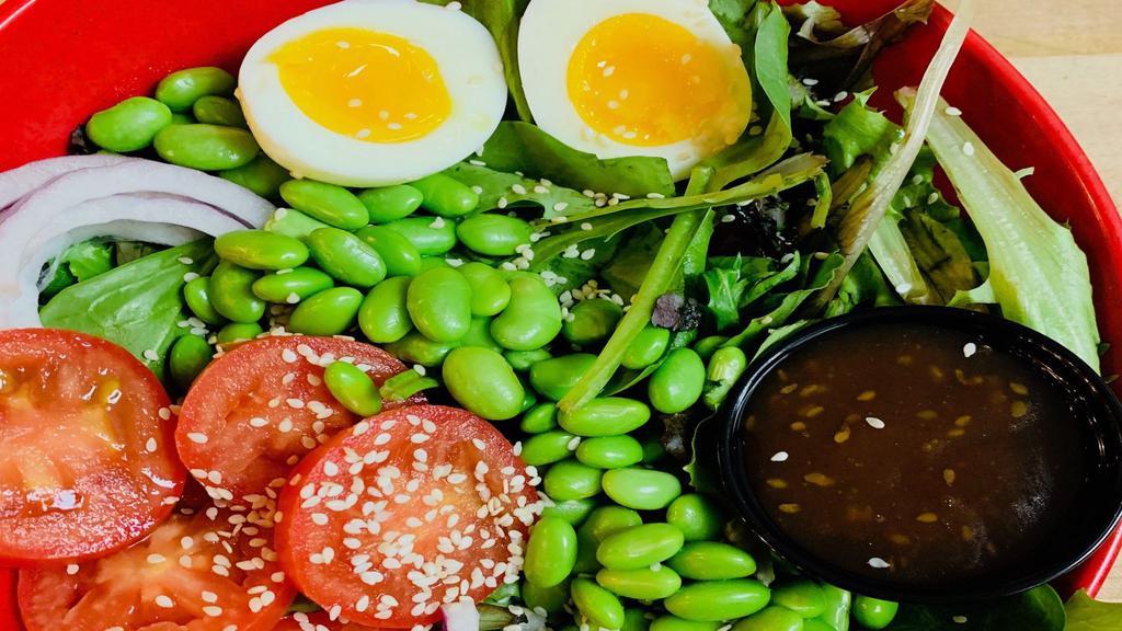 Asian Salad With Sesame Oriental Dressing · Mixed greens, tomato, onions, sesame seeds, egg, edamame, soybeans and Asian dressing on the side.