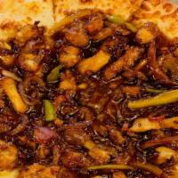 The Orange Chicken Pizza · Chicken, Bell Pepper, onion, orange sauce and green onion