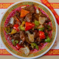 Mongolian Beef · Beef stir fried with onions and bell peppers.