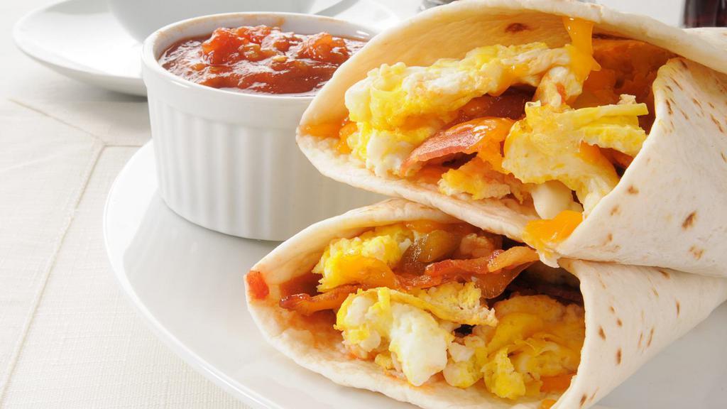 Bacon Supreme Breakfast Burrito · Crispy bacon made to perfection filled with home fried potatoes and scrambled eggs.