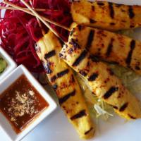 4 Piece Chicken Satay · Chicken breast marinated with thai herbs served with peanut sauce and cucumber chutney.