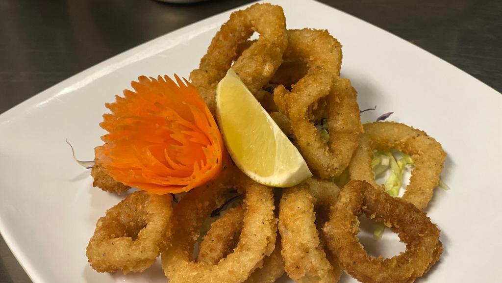 Fried Calamari · Calamari lightly breaded and fried to perfection. Served with spicy mayo sauce.