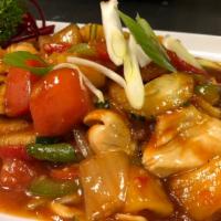 Sweet & Sour Entree · Choice of protein sauteed in thai sweet and sour sauce with tomatoes, onions, cucumber, pine...