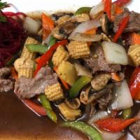 Thai Pepper Steak Entree · Beef only. Stir fried with beef, bell pepper, mushroom, zucchini, carrot, baby corn, and oni...