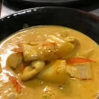 Yellow Curry · Mild yellow curry and choice of protein cooked with coconut milk, potatoes, carrot, and onio...