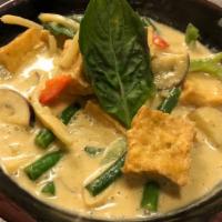 Green Curry · Green curry paste and choice of protein cooked with coconut milk, bamboo shoots, eggplant, g...