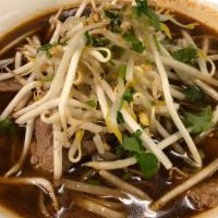 Noodle Soup · Rice noodle in clear broth with bean sprouts and topped with scallions and cilantro. Add veg...