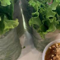 Fresh Rolls · Green leaf lettuce and cucumbers in a rice paper wrap and served with peanut sauce.