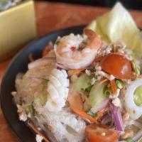 Yum Woon Sen | Glass Noodle Salad · Glass noodles with squid, prawns, minced chicken, chopped vegetables, fresh herbs and lime d...