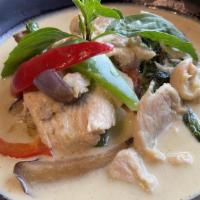 Green Curry (Gf) · Central Thai curry in coconut milk with bell peppers, eggplants, green beans and topped with...