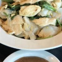 Rama Noodle · Wide rice noodles wok fried with egg, spinach and served with peanut sauce.